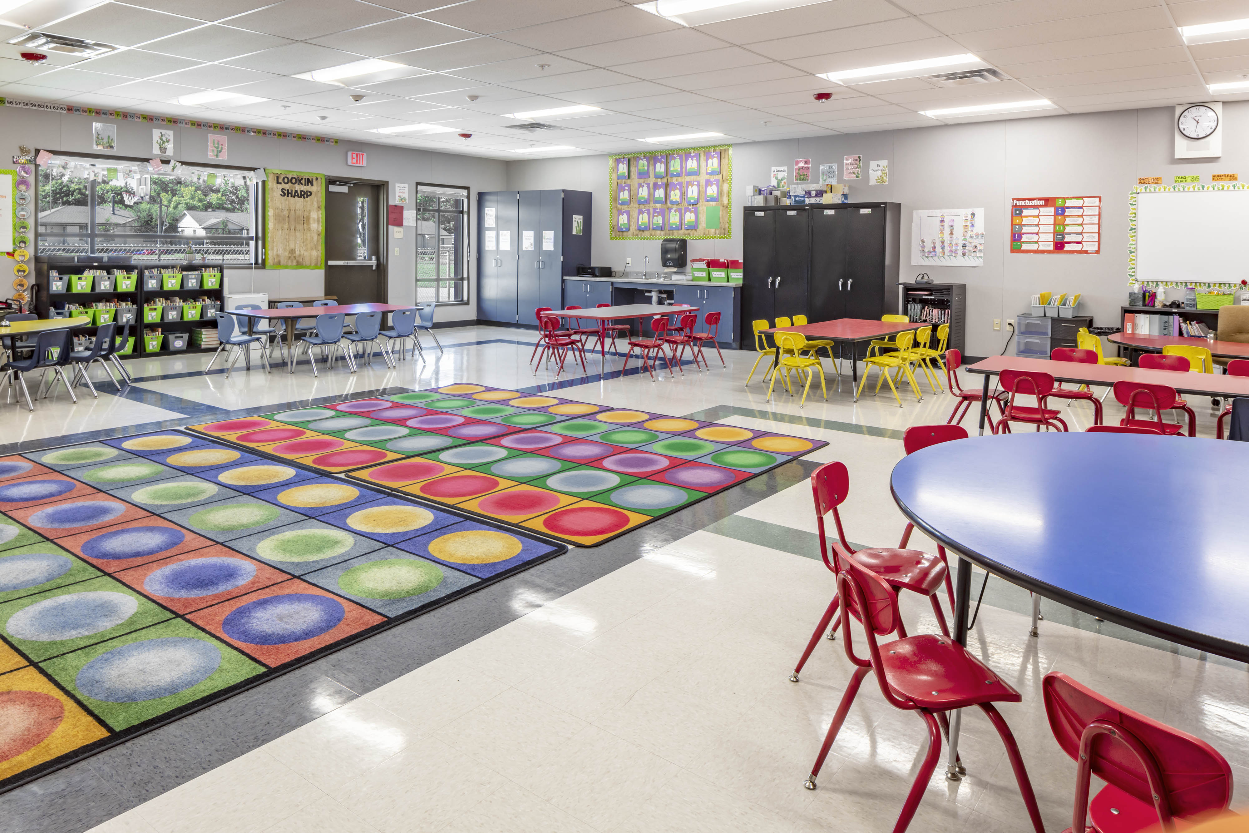 Elementary students learning table setting